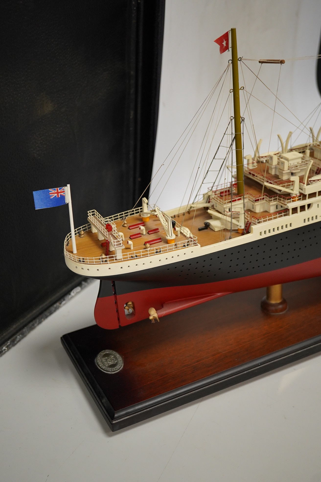 An 'Authentic Models' model of the ocean liner RMS Titanic, on stand, 100cm long. Condition - good.